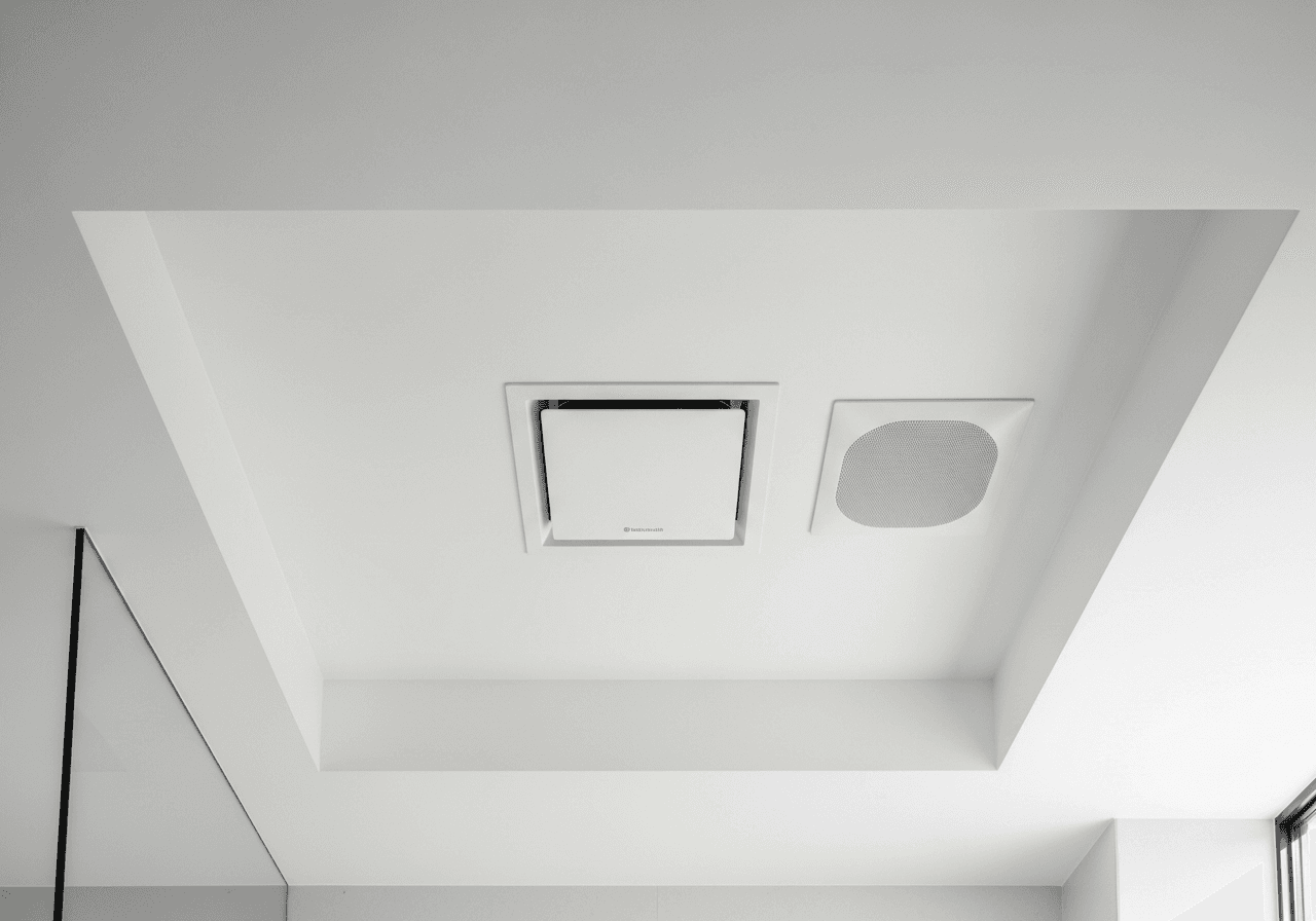 Modern bathroom ceiling with sleek ultra-quiet vent fan and Bluetooth speaker integration